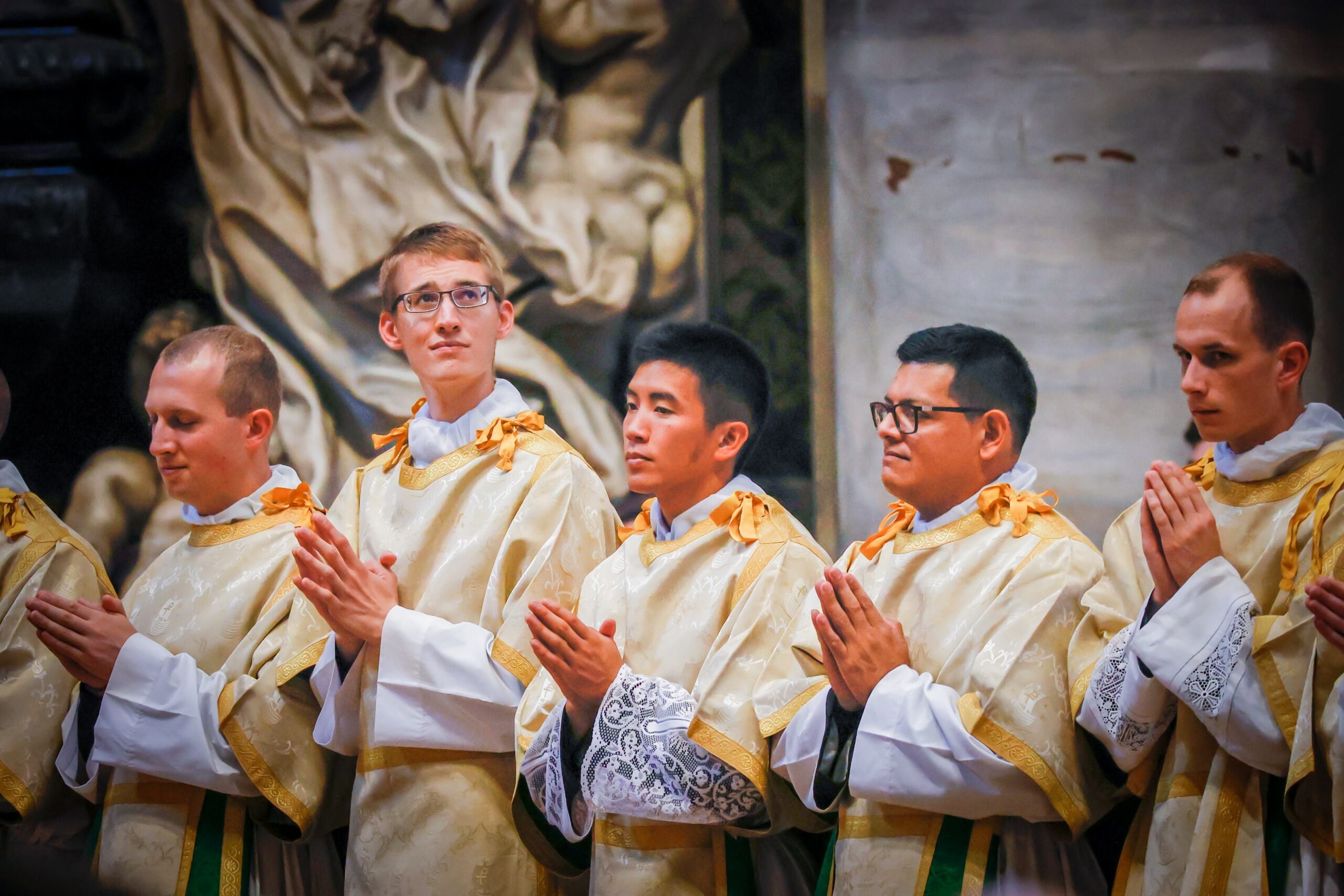 Deacon Zane Langenbrunner, second from left, at his Sept. 29, 2022 ordination as a transitional deacon in St. Peter's Basilica. Deacon Langenbrunner, an Indiana native, was selected to chant the Exsultet at the April 8, 2023, Easter Vigil with Pope Francis in St. Peter's Basilica. (OSV News photo/Jennifer Barton, Today's Catholic)