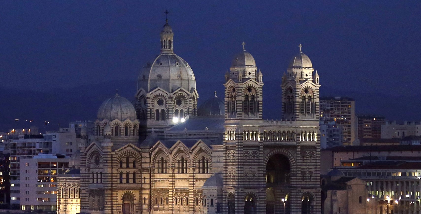 A file photo shows the Marseille cathedral illuminated in France. In a rather unusual moment for secular France, President Emmanuel Macron confirmed he will attend Mass celebrated by Pope Francis in Marseille Sept. 23, 2023. (OSV News photo/Jean-Paul Pelissier, Reuters)