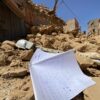 A notebook is seen Sept. 9, 2023, amid the rubble in Amizmiz, Morocco, in the aftermath of the deadliest earthquake to hit the country in decades, killing at least 2,000 people. The U.S. Geological Survey recorded a magnitude 6.8 quake at 11:11 p.m. (local time) Sept. 8, while Morocco's seismic monitoring agency measured it at magnitude 7. (OSV News photo/Abdelhak Balhaki, Reuters)