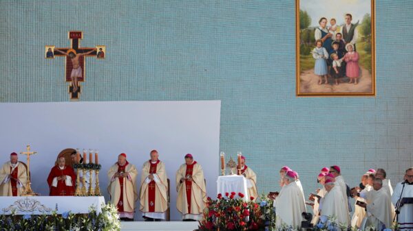 Cardinal Marcello Semeraro, papal envoy (in red), concelebrates the Sept. 10, 2023, beatification Mass of the Ulma family, who were martyred for sheltering Jews in Markowa, Poland, under German occupation during World War II. Józef and Wiktoria and their seven children were proclaimed "Blessed" during the Mass. The Ulmas' seventh child was born as Wiktoria was executed. (OSV News photo/Patryk Ogorzalek/Agencja Wyborcza.pl via Reuters)