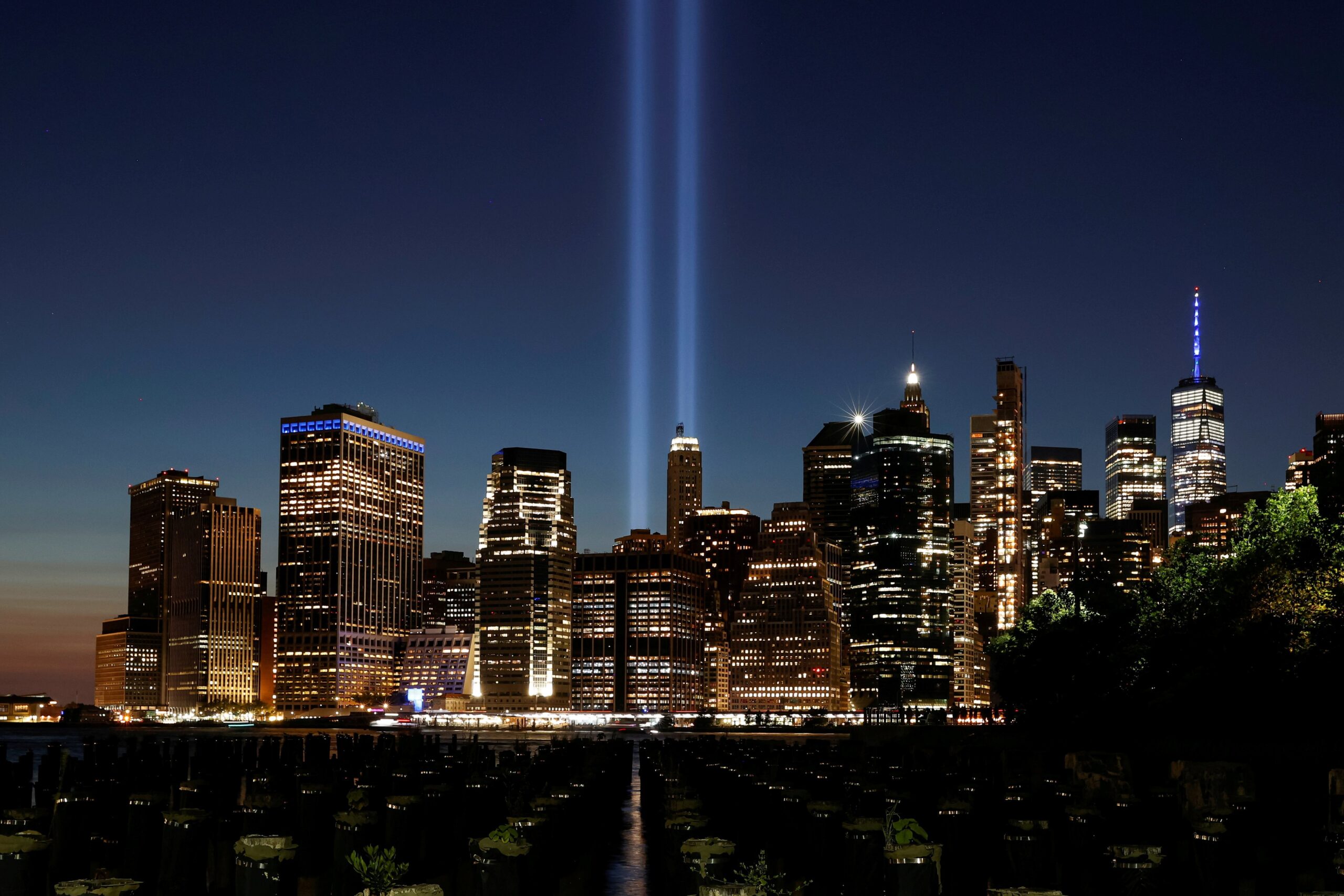 The Tribute in Light installation and the One World Trade Center tower are seen from Brooklyn Bridge Park in New York City Sept. 11, 2021, the 20th anniversary of the September 11 attacks. (OSV News photo/Brendan McDermid, Reuters)