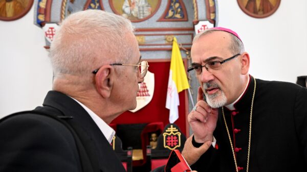 Cardinal-designate Pierbattista Pizzaballa, the Latin patriarch of Jerusalem, speaks to a journalist during a press conference in the Old City of Jerusalem Sept. 21, 2023, ahead of his elevation to the rank of cardinal during the consistory at the Vatican Sept. 30. (OSV News photo/Debbie Hill)