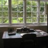 A desk overlooks the garden in The Kilns in Oxford, England, where C.S. Lewis penned his Christian stories, including "The Chronicles of Narnia." (OSV News photo, CNS file)
