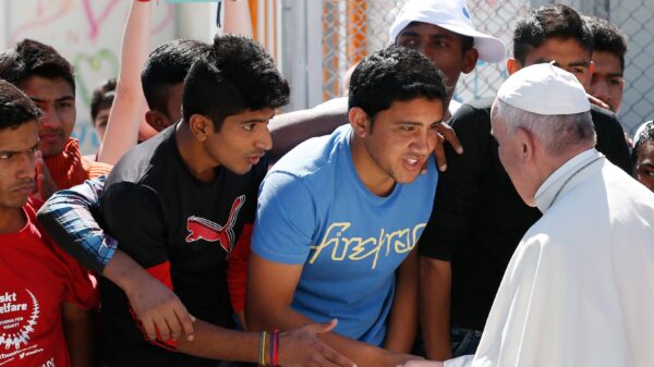 In this file photo, Pope Francis meets refugees at the Moria refugee camp on the island of Lesbos, Greece, in 2016. (CNS photo/Paul Haring)