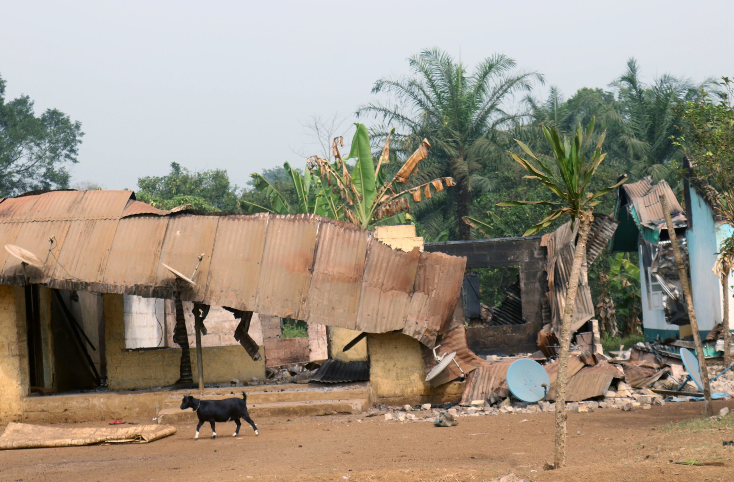 A file photo shows burned and damaged buildings in Kembong, Cameroon. A Catholic priest and three Catholic teachers in Cameroon's troubled southwest region were recovering from bullet wounds after they were shot in what church authorities say was a targeted attack on a Catholic primary school in Kembong Sept. 26, 2023. The attack comes amid seven years of a separatist conflict in the African country. (OSV News photo/Josiane Chemou, Reuters)