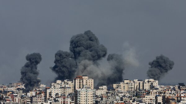 Smoke rises following Israeli strikes in Gaza, Oct. 7, 2023. The strikes were in retaliation after Hamas breached Israeli security along the Gaza border at dawn and entered border communities amidst a barrage of over 2,000 rockets that reached into Jerusalem and the Tel Aviv. (OSV News photo/Mohammed Salem, Reuters)