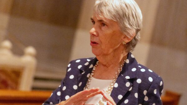 Sharon O’Brien, director and co-founder of Catholics for Family Peace Education and Research on Domestic Abuse, speaks to a reporter Oct. 7, 2023, at the Basilica of the National Shrine of the Immaculate Conception in Washington. O'Brien's group organized a Mass celebrated that day at the national shrine to mark Domestic Violence Awareness Month, observed every October. (OSV News photo/Mihoko Owada, Catholic Standard)