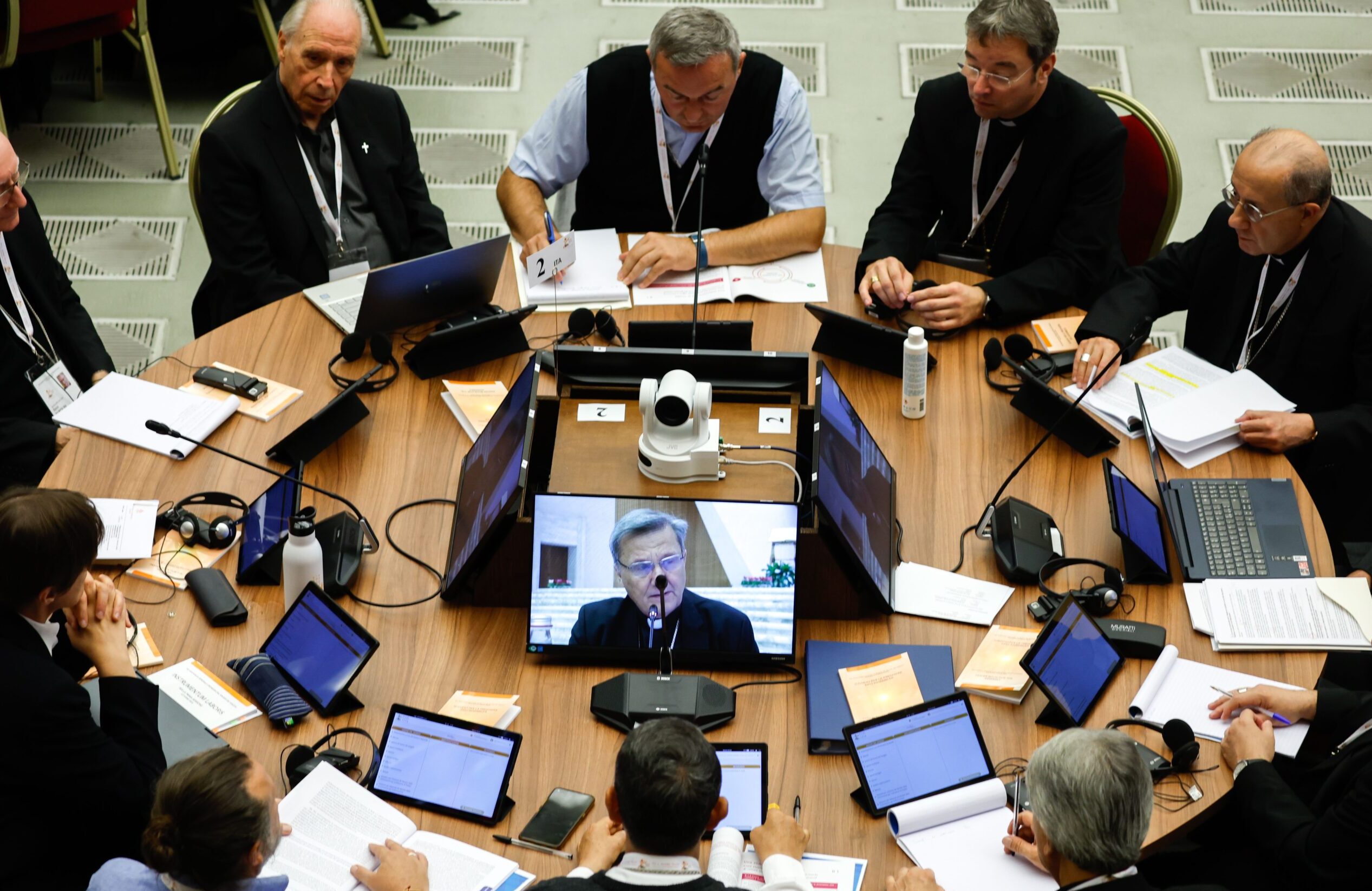 Members of the assembly of the Synod of Bishops begin work on communion as the second theme of the synod in the Vatican's Paul VI Audience Hall Oct. 9, 2023. (CNS photo/Lola Gomez)