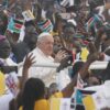 Pope Francis greets the crowd Feb. 5, 2023, as he arrives to celebrate Mass at the John Garang Mausoleum in Juba, South Sudan. (CNS photo/Paul Haring)