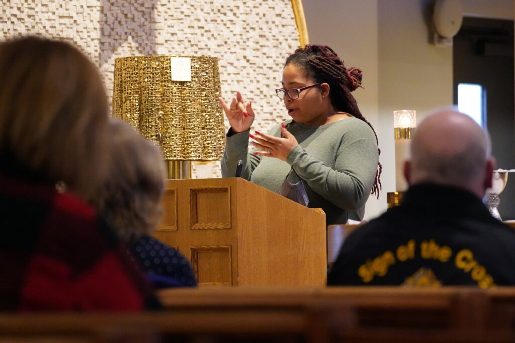 Corinne Griske uses American Sign Language while serving as a lector during a Mass for members of the Catholic Deaf Community of Long Island, N.Y., on the Fourth Sunday of Advent at St. Frances de Chantal Church in Wantagh, N.Y., Dec. 20, 2020. (CNS photo/Gregory A. Shemitz)