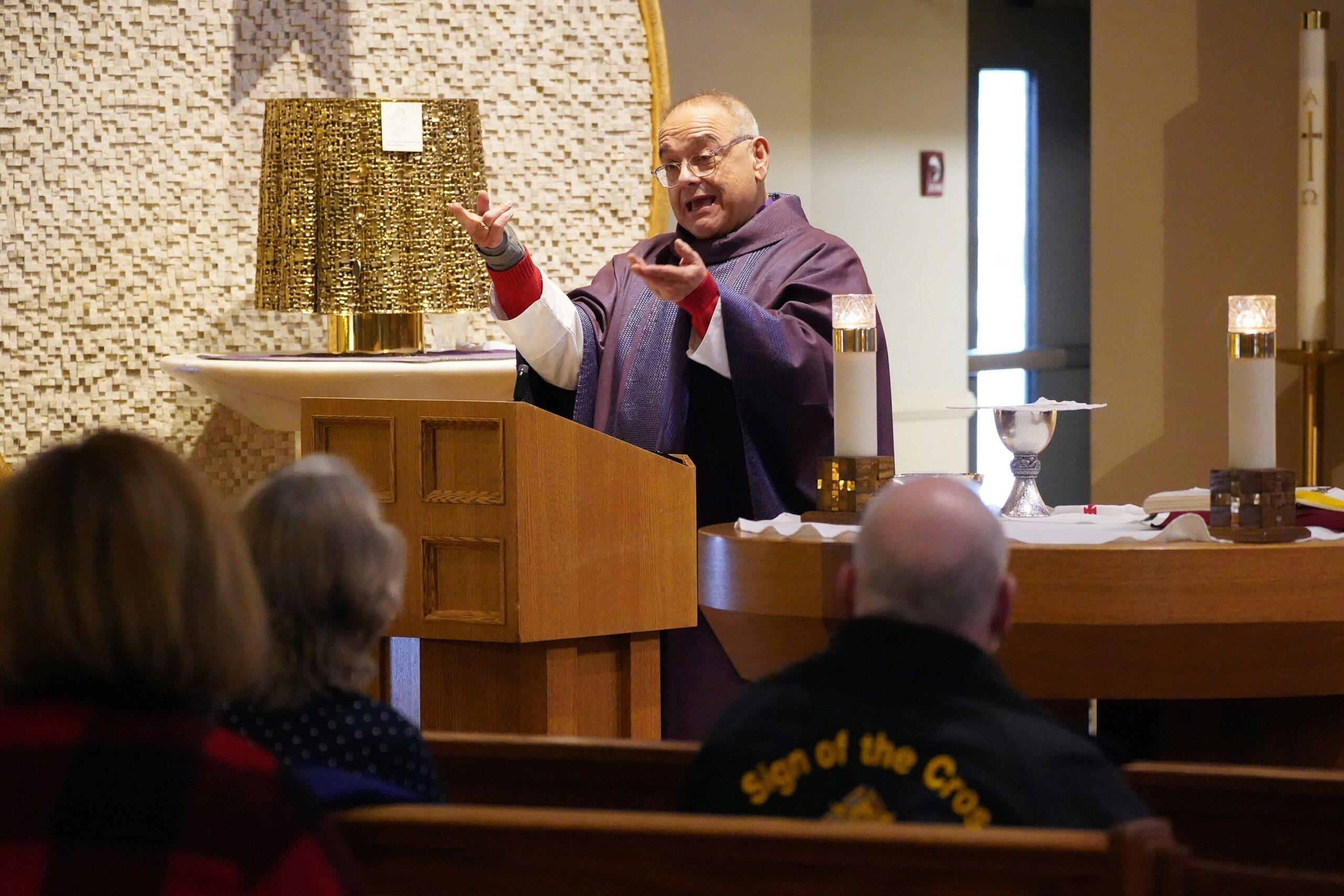 Msgr. Thomas Costa uses American Sign Language as he celebrates Mass for members of the Catholic Deaf Community of Long Island, N.Y., on the Fourth Sunday of Advent at St. Frances de Chantal Church in Wantagh, N.Y., Dec. 20, 2020. (CNS photo/Gregory A. Shemitz)