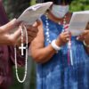People hold rosaries while participating in a roadside prayer rally marking Religious Freedom Week at St. James Church in Setauket, N.Y., June 24, 2020. (OSV News photo/CNS file, Gregory A. Shemitz)