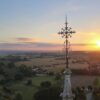 A file photo shows a cross atop the Shrine of Our Lady of Montligeon in France. Dubbed "the shrine that does good to souls," Montligeon is located about 93 miles West of Paris and is famous for praying for the deceased and supporting their families. (OSV News photo/courtesy Montligeon Sanctuary)
