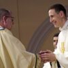 Father Stephen Rooney smiles as he exchanges the sign of peace with Bishop John O. Barres of Rockville Centre, N.Y., during his ordination to the priesthood at St. Agnes Cathedral in Rockville Centre June 18, 2022. (OSV News photo/Gregory A. Shemitz)