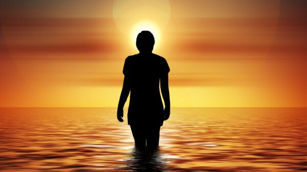 A silhouette of a solitary individual walking toward the sun. Nov. 18 marks International Survivors of Suicide Loss Day, dedicated to those who wrestle with the complex and often silent grief of having lost loved ones to suicide. (OSV News photo/Gerd Altmann, Pixabay)