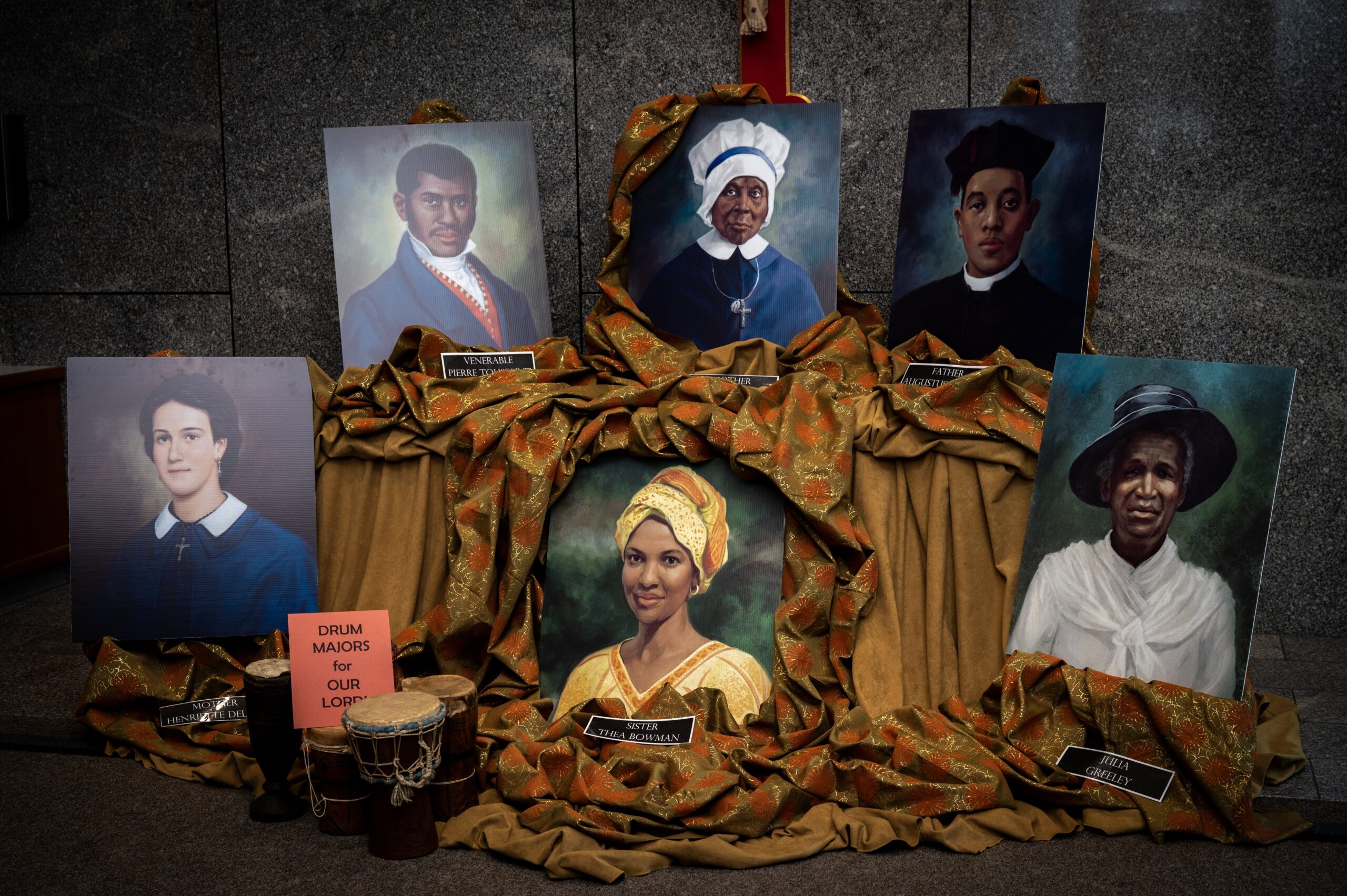 Portraits of six African Americans who are sainthood candidates are displayed in the lobby of the Catholic Center in Baltimore in November 2023 for Black Catholic History Month. The six are: (from left top row) Pierre Toussaint, a noted philanthropist; Mother Mary Lange, founder of the Baltimore-based Oblate Sisters of Providence; and Father Augustus Tolton, the first Catholic priest in the U.S. known publicly to be Black. From left bottom row are Mother Henriette Delille, founder of the New Orleans-based Sisters of the Holy Family; Sister Thea Bowman, the first African American to become a member of the Franciscan Sisters of Perpetual Adoration; and Julia Greeley, known as the city of Denver's "Angel of Charity." (OSV News/Kevin J. Parks, Catholic Review)