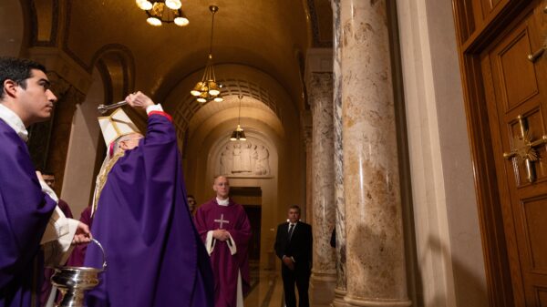 Archbishop Timothy P. Broglio, who heads the U.S. Archdiocese for the Military Services and is president of the U.S. Conference of Catholic Bishops, blesses the Holy Door after it was sealed at the Basilica of the National Shrine of the Immaculate Conception in Washington Dec. 3, 2023, the first Sunday of Advent. (OSV News photo/Alex Cranstoun, courtesy Basilica of the National Shrine of the Immaculate Conception)