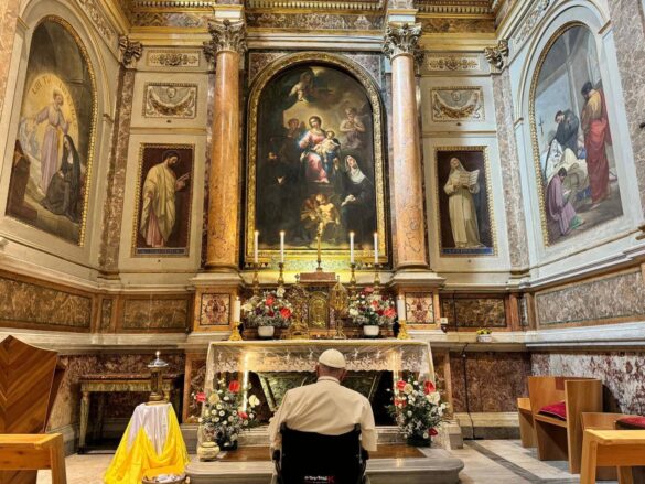 Praying at St. Monica's tomb at Augustinian basilica in Rome