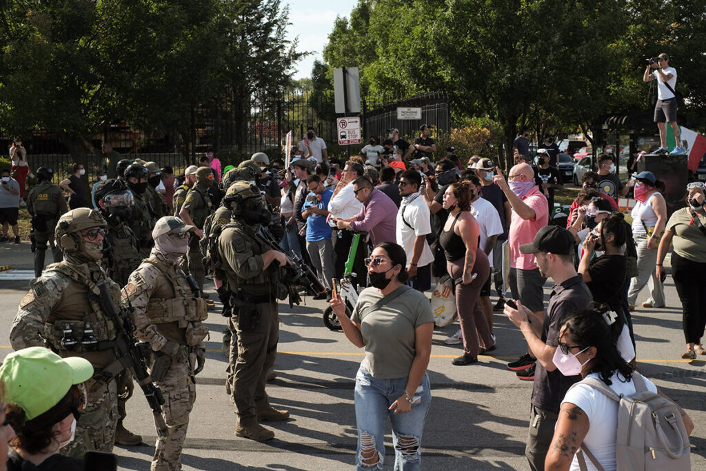 Protesters gather during a standoff with U.S. Immigration and Customs Enforcement (ICE) and federal officers in the Little Village neighborhood of Chicago Oct. 4, 2025. (OSV News photo/Jim Vondruska, Reuters)