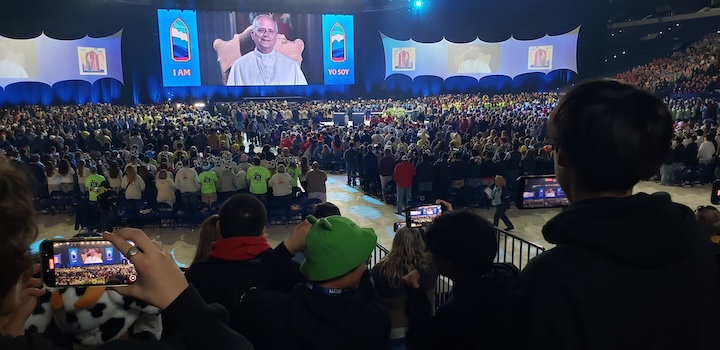 Youth embrace Pope L...