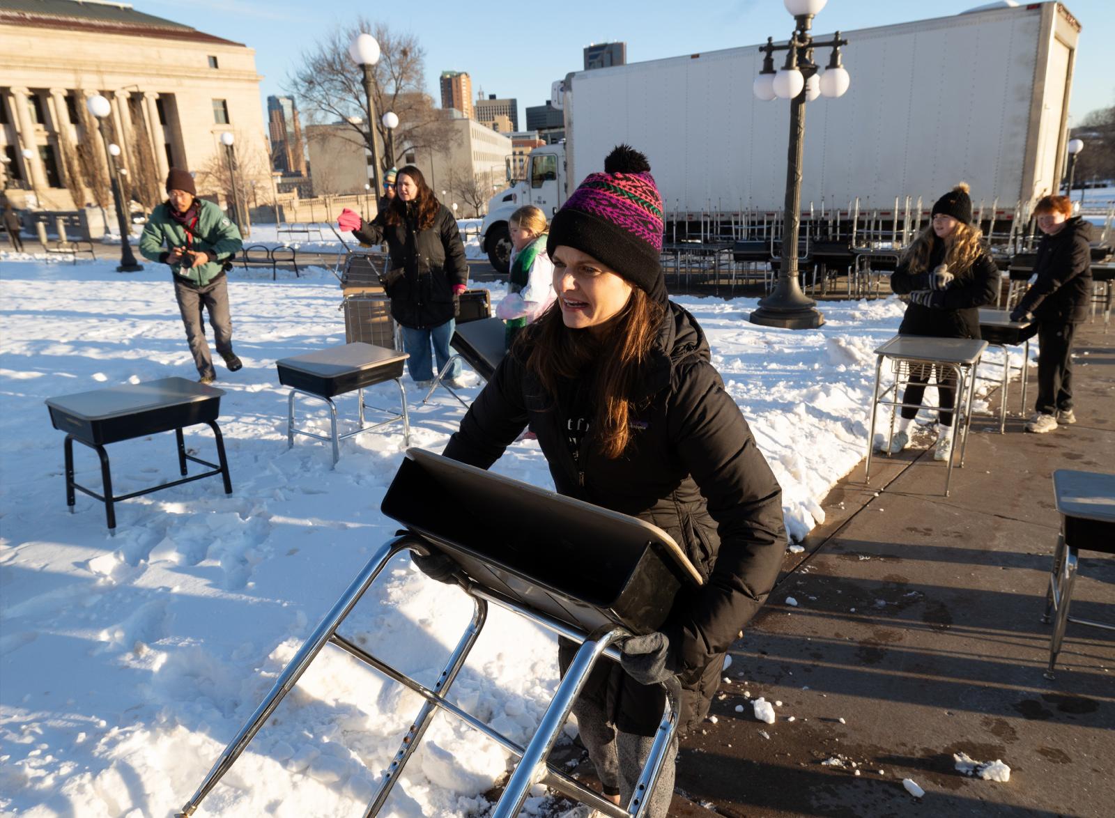 Empty school desks on Minnesota Capitol grounds signify children lost to gun violence