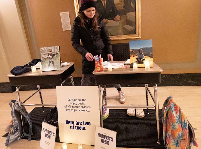 Empty school desks on Minnesota Capitol grounds signify children lost to gun violence