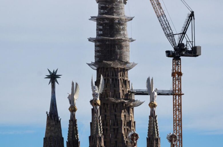 Workers place the upper arm on the cross atop the Tower of Jesus Christ, the tallest tower of the Basilica of the Holy Family, known in Spanish as the Sagrada Familia, in Barcelona, Spain, Feb. 20, 2026. Pope Leo XIV will visit Barcelona in June 2026 to mark the centenary of the death of the Sagrada Familia’s iconic architect, Servant of God Antoni Gaudí. (OSV News photo/Nacho Doce, Reuters)