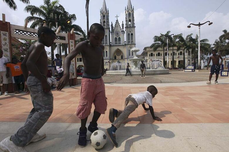 A file photo shows children playing soccer near the Malabo Cathedral in Malabo, the capital of Equatorial Guinea. The majority of the population of Equatorial Guinea is Christian. Pope Leo XIV will embark on a 10-day apostolic tour of Africa from April 13–23, 2026, visiting Equatorial Guinea, Algeria, Cameroon, and Angola. (OSV News photo/Luc Gnago, Reuters)