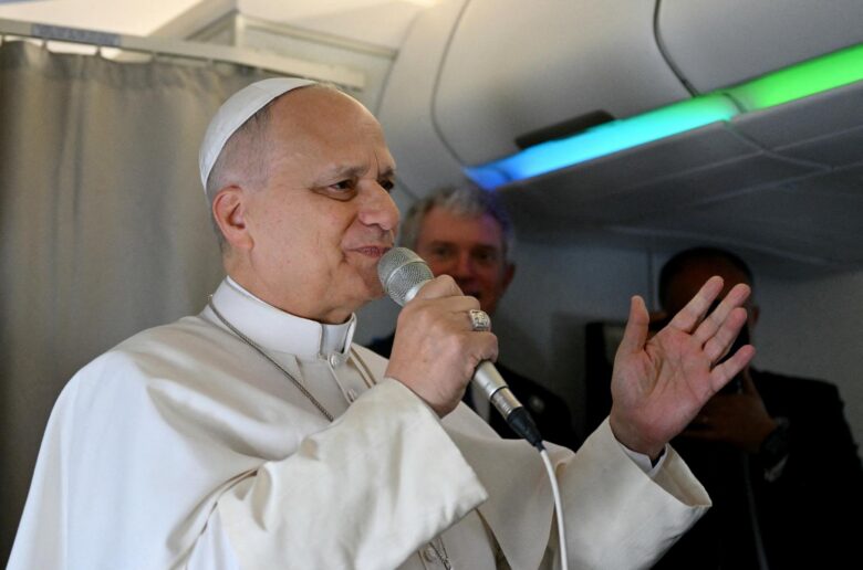 Pope Leo XIV addresses journalists during the flight heading to Algiers on April 13, 2026. Pope Leo XIV embarks on April 13 on an 11-day visit to Algeria, Cameroon, Angola and Equatorial Guinea for his first major international trip since becoming pontiff in May 2025 (OSV News/Alberto Pizzoli, Reuters)
