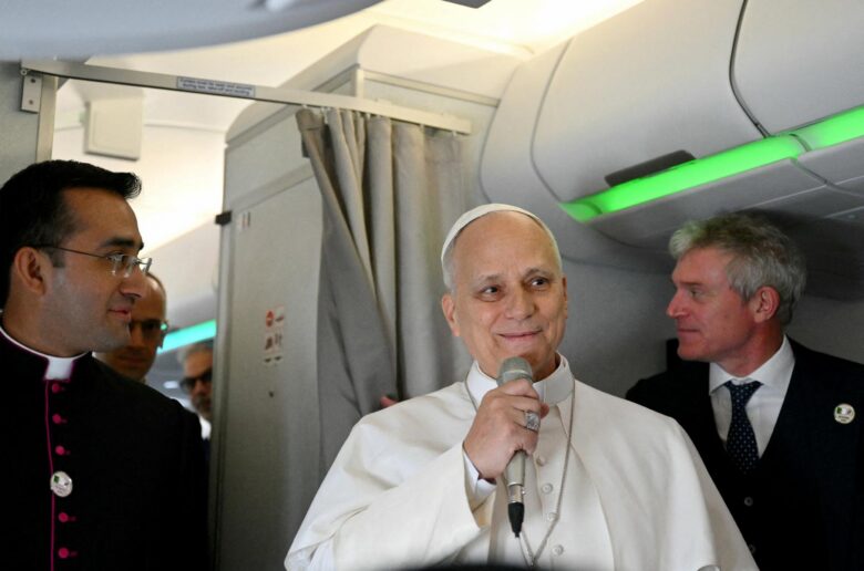 Pope Leo XIV addresses journalists during the flight heading to Algiers on April 13, 2026. U.S.-born Pope Leo pushed back that day on President Donald Trump's broadside against him over the U.S.-Israel war in Iran, telling reporters that the Vatican's appeals for peace and reconciliation are rooted in the Gospel, and that he doesn't fear the Trump administration. (OSV News photo/Alberto Pizzoli, pool via Reuters)