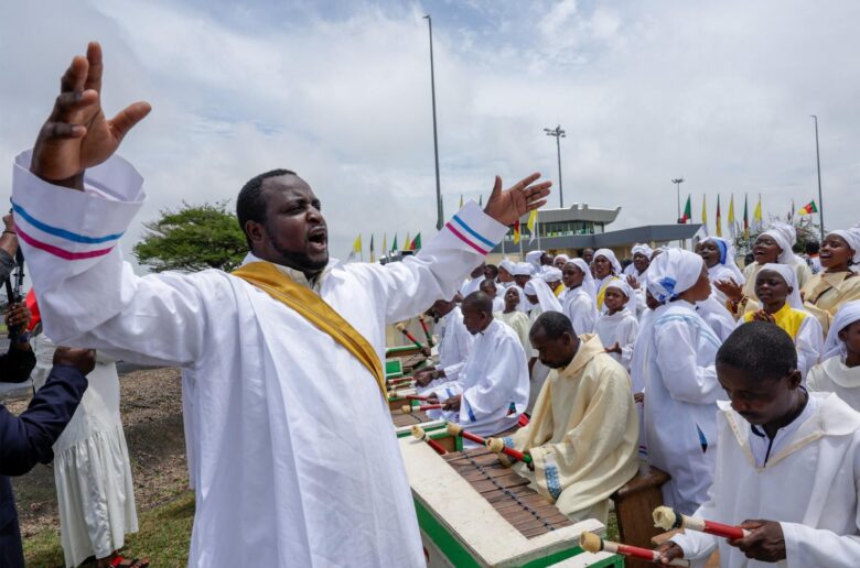 A music director leads people in rehearsal April 15, 2026, before the arrival of Pope Leo XIV at Yaounde Nsimalen International Airport in Yaounde, Cameroon, to begin his apostolic journey to the African country. (OSV News photo/Luc Gnago, Reuters)