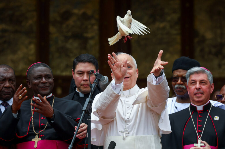 Pope Leo XIV releases a dove after he attended a Meeting for Peace at St. Joseph's Cathedral in Bamenda, Cameroon, April 16, 2026. (OSV News photo/Guglielmo Mangiapane, Reuters)