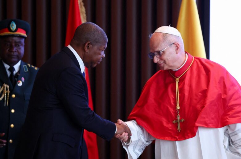 Pope Leo XIV and Angolan President Joao Lourenco shake hands as they attend a meeting with the authorities, civil society and the diplomatic corps in Luanda, Angola, April 18, 2026. (OSV News photo/Guglielmo Mangiapane, Reuters)