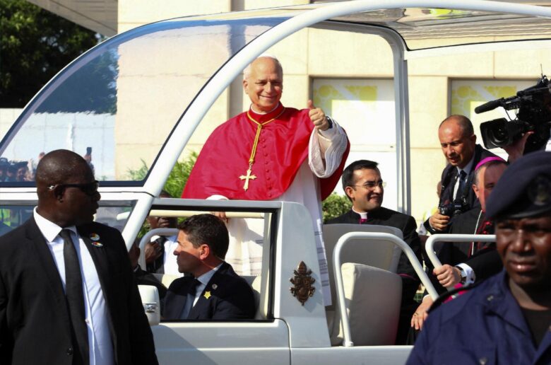 Pope Leo XIV gestures to people as he begins his apostolic journey to Angola, in Luanda, Angola, April 18, 2026. (OSV News photo/Cesar Muginga, Reuters)