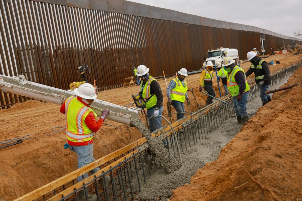 Machinery and workers build a secondary section of the black-colored border wall on the U.S.-Mexico border, seen from Ciudad Juarez, Mexico, March 10, 2026. A group of U.S. bishops, most from the U.S.-Mexico border region, wrote a May 20 letter to members of Congress expressing "grave concern" over budget legislation that would provide an additional $72 billion for immigration enforcement. (OSV News photo/Jose Luis Gonzalez, Reuters)