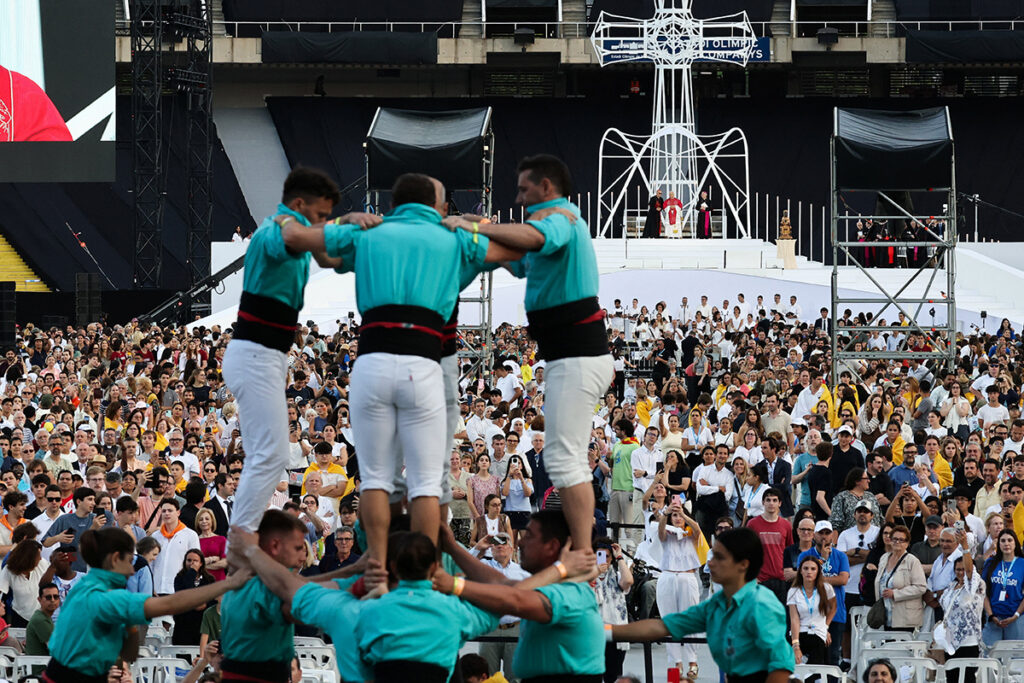Pope Leo XIV watches as Castellers de Vilafranca form a human tower during a prayer vigil at the Lluis Companys Olympic Stadium, during his apostolic journey, in Barcelona, Spain, June 9, 2026. (OSV News photo/Yara Nardi, Reuters)