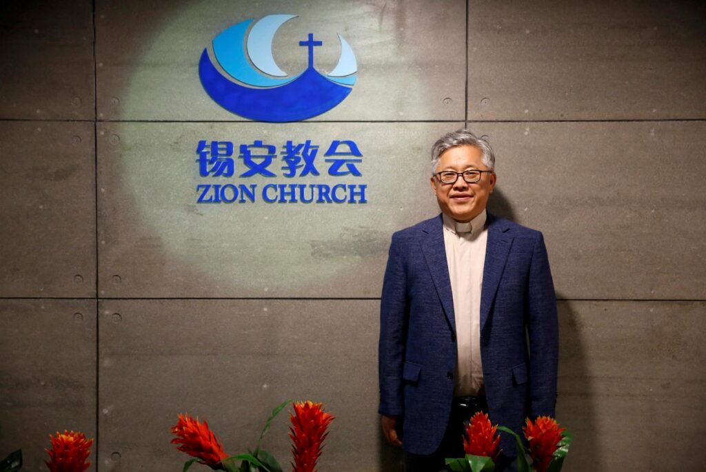 Ezra Jin Mingri, lawmakers call on Trump to push Xi to free prisoners of conscience
