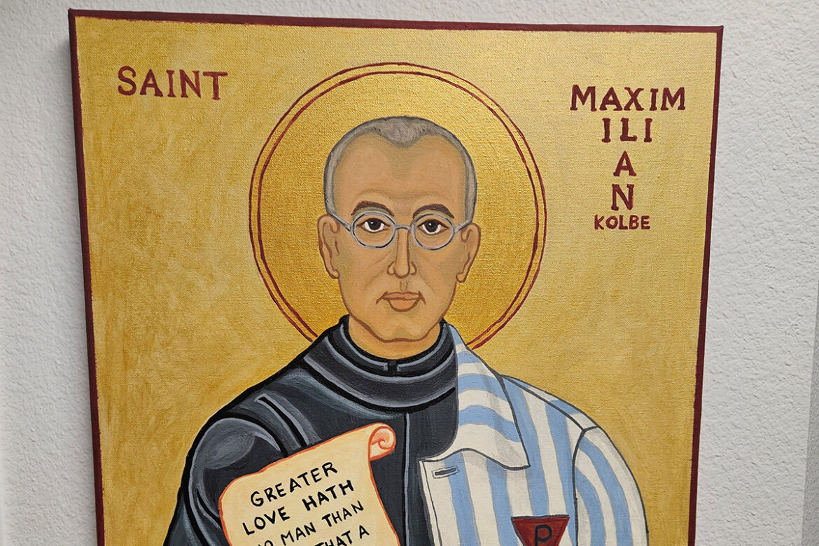 The picture of part of an icon of St. Maximilian Kolbe in the office of Deacon Robert Ehnow is seen in an undated photo. The Polish priest gave his life in place of a young father condemned to execution by the Nazis at Auschwitz during World War II. His feast day is Aug. 14, the day of his death. (OSV News photo/courtesy of Deacon Robert Ehnow)