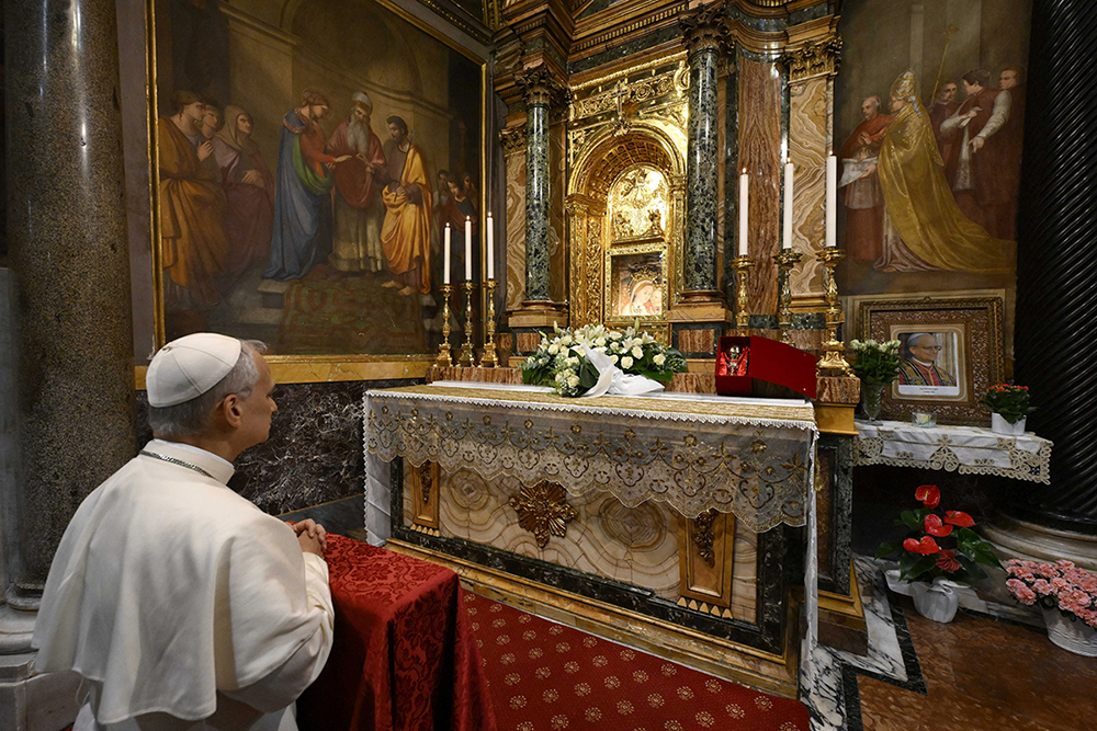 Pope Leo XIV prays in front of a fresco of Our Lady of Good Counsel at the shrine named after the image in Genazzano, Italy, southeast of Rome, May 10, 2025. Pope Leo will celebrate Mass in the Basilica Shrine of Our Lady of Good Counsel on the eve of the feast of the Nativity of the Blessed Virgin Mary Sept. 7, 2026. (CNS photo/Vatican Media)