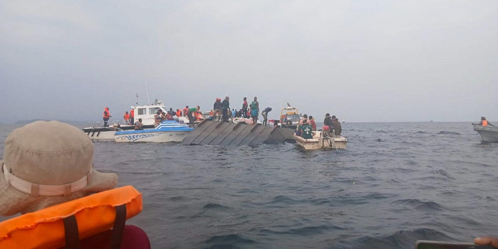 Rescue workers and local boat operators take part in ongoing search and recovery operations near the overturned passenger ferry on Lake Kariba in Kariba, Zimbabwe, Aug. 12, 2026, a day after the vessel capsized. Pope Leo XIV expressed his condolences to the families of the victims of the tragic Aug. 11 ferry accident that has killed more than 90 people. (OSV News photo/Admore Mbonda, Reuters)