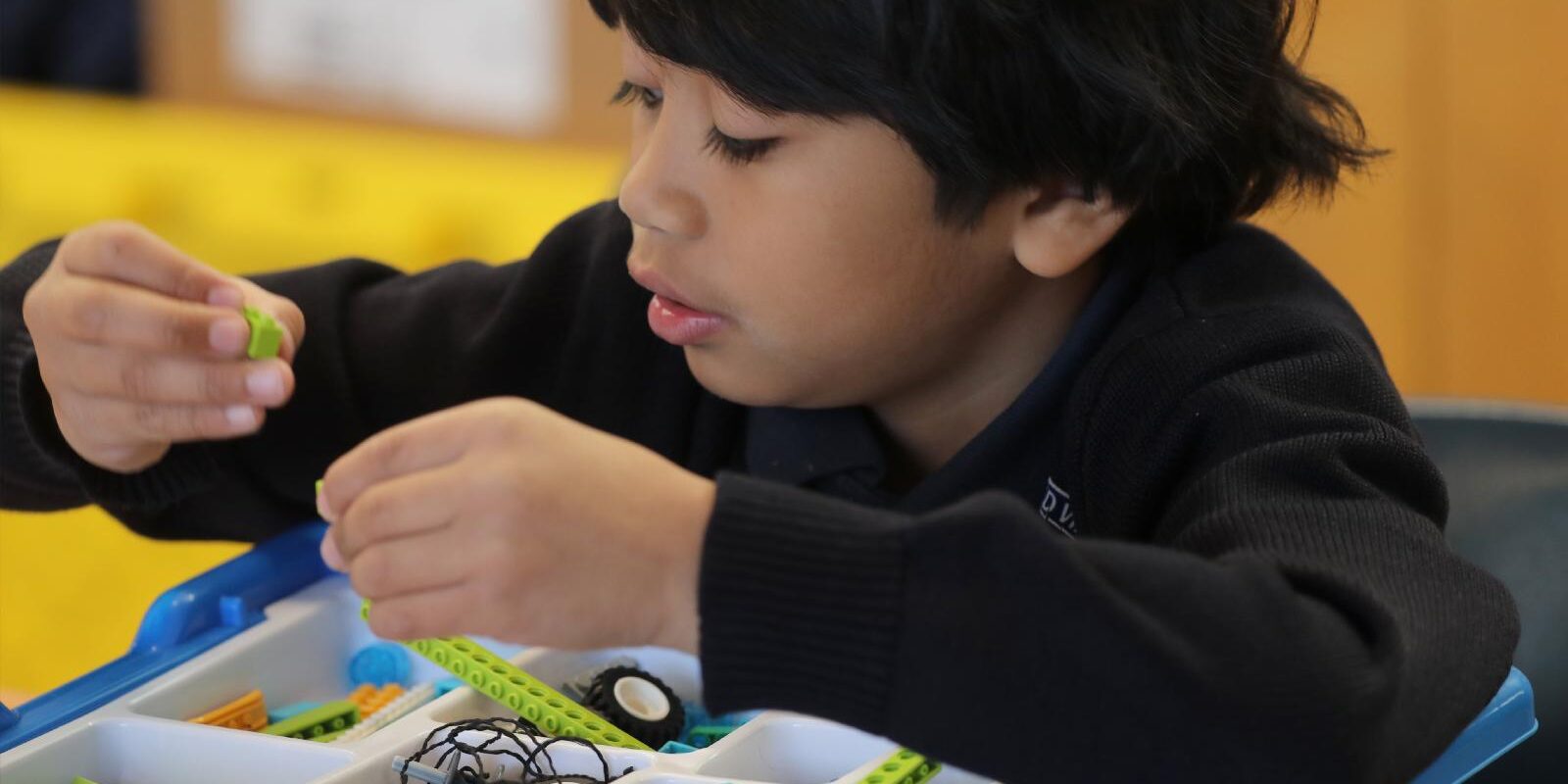 Second-grader Isaiah Carson works in a science, technology, engineering and math program, or STEM, at Assumption of the Virgin Mary School in Pasadena, Calif., Jan. 15, 2025. At the start of a new school year, Catholic educators describe how they are making use of AI and responding to its challenges. (OSV News photo/Bob Roller)