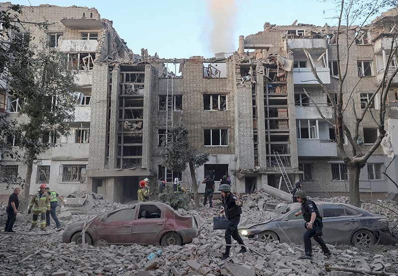 Rescuers work at the site of an apartment building in Lviv, Ukraine, July 30, 2026, hit by a Russian missile strike, amid Russia's attack on Ukraine. A Russian ballistic missile and drone barrage across Ukraine killed at least eight civilians, including children, and injured more than 50 others, officials said July 30, and NATO scrambled its warplanes after one of the missiles crossed into Poland. (OSV News photo/Roman Baluk, Reuters)