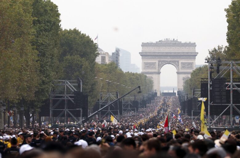 People gather at the Champs-Elysees Avenue in Paris ahead of Pope Leo XIV’s open-air Mass at the Place de la Concorde during his four-day apostolic journey to France, Sept. 26, 2026. (OSV News photo/Gonzalo Fuentes, Reuters)