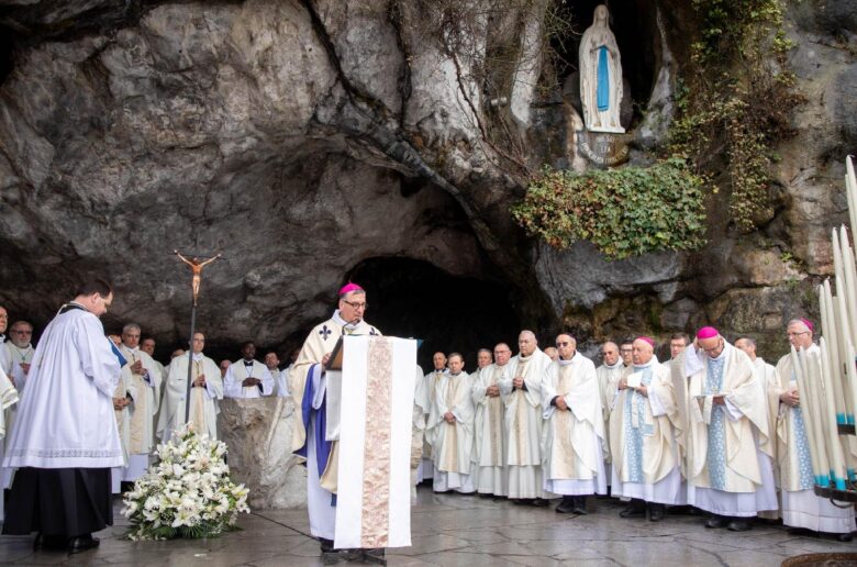 French Bishop Jean-Marc Micas of Tarbes and Lourdes is seen praying at the Lourdes grotto Feb. 11, 2026, the feast of Our Lady of Lourdes. During Pope Leo XIV's Sept. 25-28, 2026, visit to France, the pontiff will fly to the south of France the afternoon of Sept. 26 and that evening will go to pray in Lourdes at the grotto of the apparitions of the Virgin Mary. (OSV News photo/courtesy Lourdes Sanctuary)