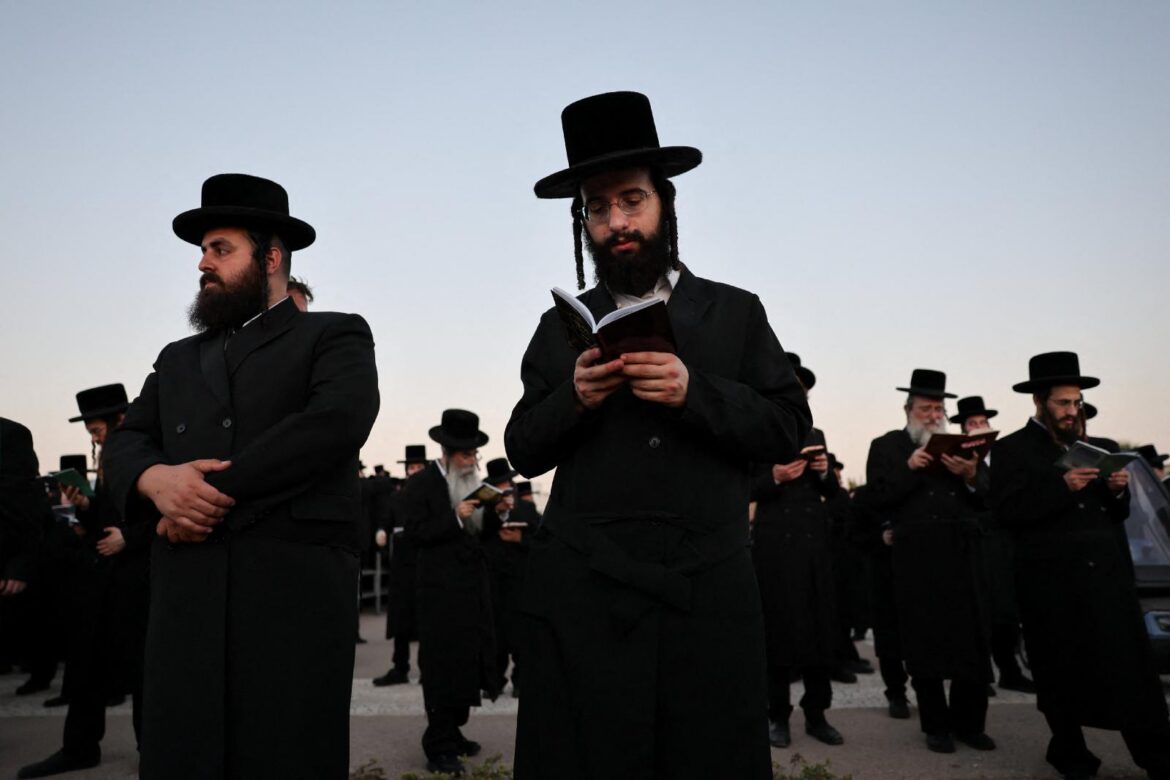 Ultra-Orthodox Jewish men perform the Tashlich ritual of symbolically casting away sins in Netanya, Israel, Sept. 17, 2026, ahead of Yom Kippur, the Jewish Day of Atonement. Bishop Joseph C. Bambera of Scranton, Pa., chairman of the US. bishops' Committee on Ecumenical and Interreligious Affairs, has released a video message to the Jewish community as it celebrates Yom Kippur Sept. 20-21 amid rising antisemitism. (OSV News photo/Ammar Awad, Reuters)