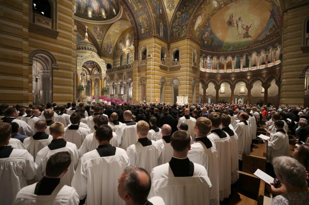 Seminarians watch as prelates process in at the start of the vespers for Venerable Fulton J. Sheen Sept. 23, 2026, at the Cathedral Basilica of St. Louis, the eve of his beatification. Archbishop Sheen is remembered as one of the most influential and innovative evangelists in American history. (OSV News photo/Bob Roller)