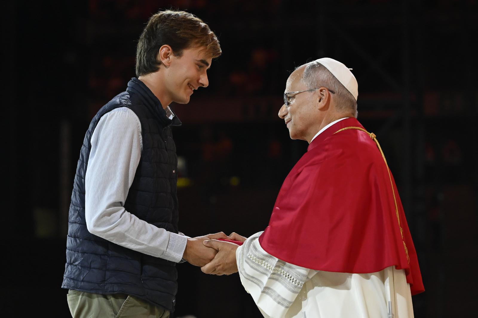 Pope encourages French youth to seek holiness during visually rich stadium vigil