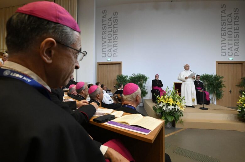 A bishop listens as Pope Leo XIV addresses catechumens and newly baptized Catholics at the Catholic Institute of Paris, after more than 20,000 adults were baptized in France this year, in Paris, Sept. 26, 2026. (OSV News photo/Simone Risoluti, Vatican Media)