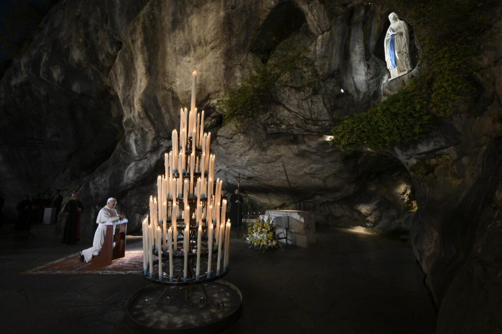 Pope Leo prays for the sick and suffering in the Lourdes grotto in France