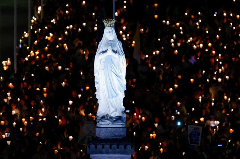 Faithful attend a candlelight procession with Pope Leo XIV at the Sanctuary of Our Lady of Lourdes during his four-day apostolic journey to France, in Lourdes, France, Sept. 27, 2026. (OSV News photo/Remo Casilli, Reuters)